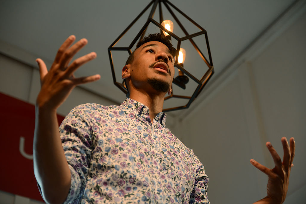 Caleb Rainey recites poetry from his book "Look, Black Boy"